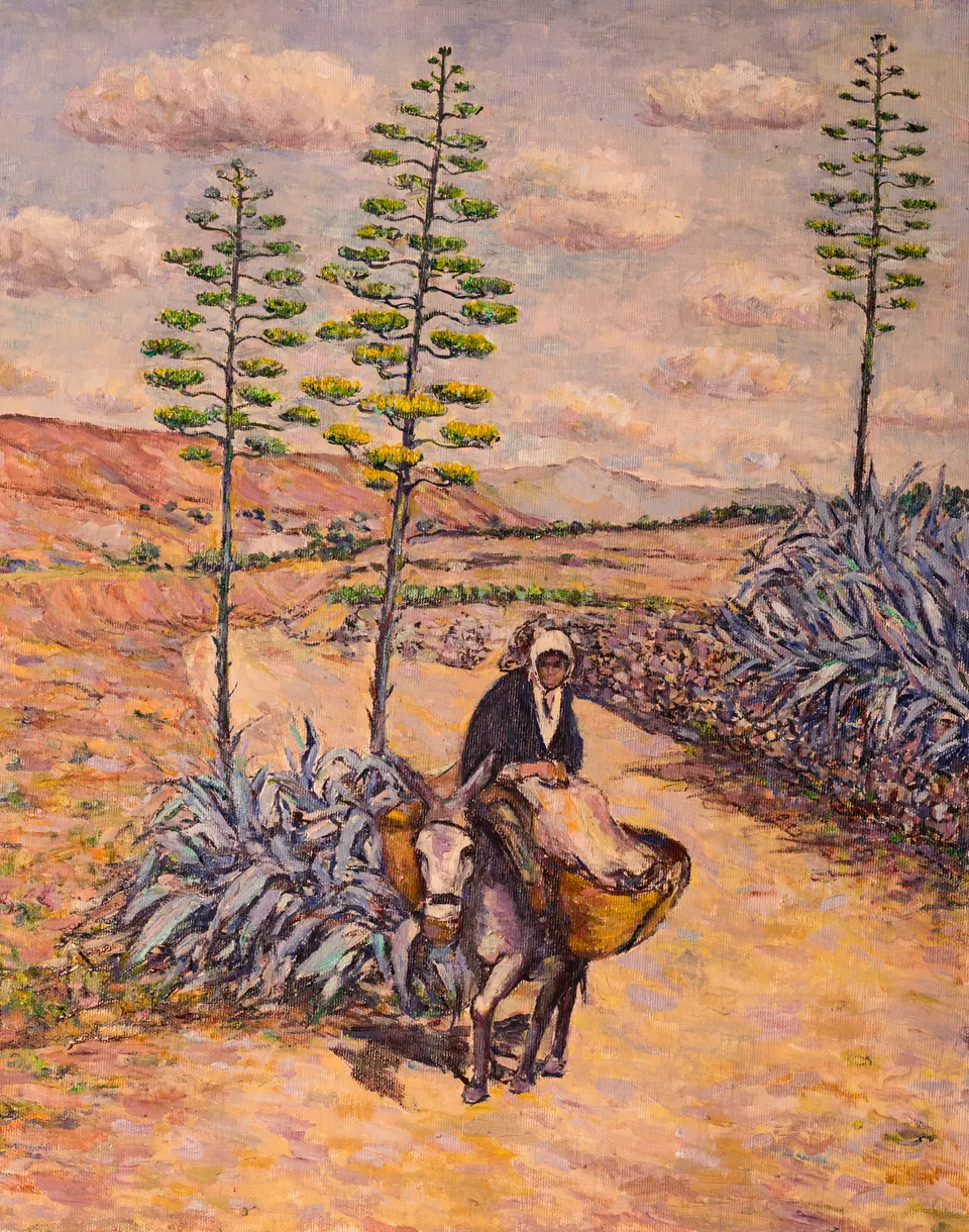 Mujer a lomos del burro