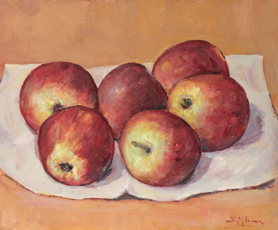 Manzanas rojas sobre un paño