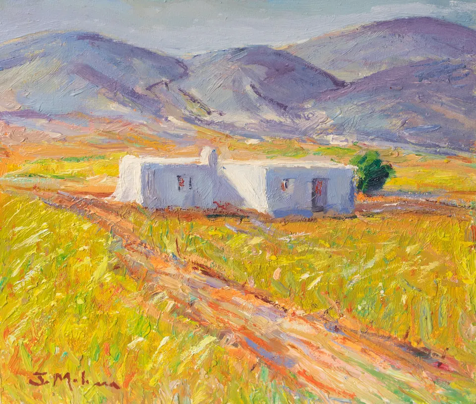 Cortijo en el campo verde