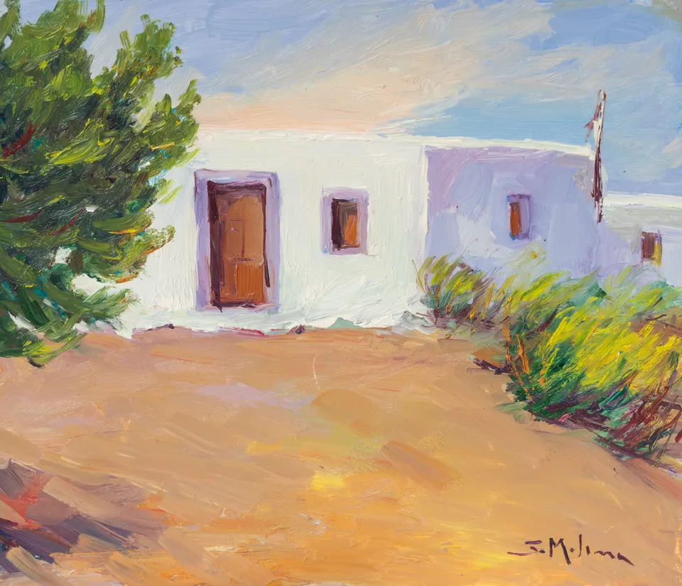 Casa tras el árbol oscuro